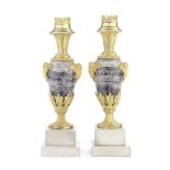 A pair of 19th century French gilt bronze and purple fluorspar and marble candlesticks (2)