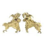 A pair of French gilt bronze chimera or dragon chenets in the R&#233;gence style, 18th / 19th ce...