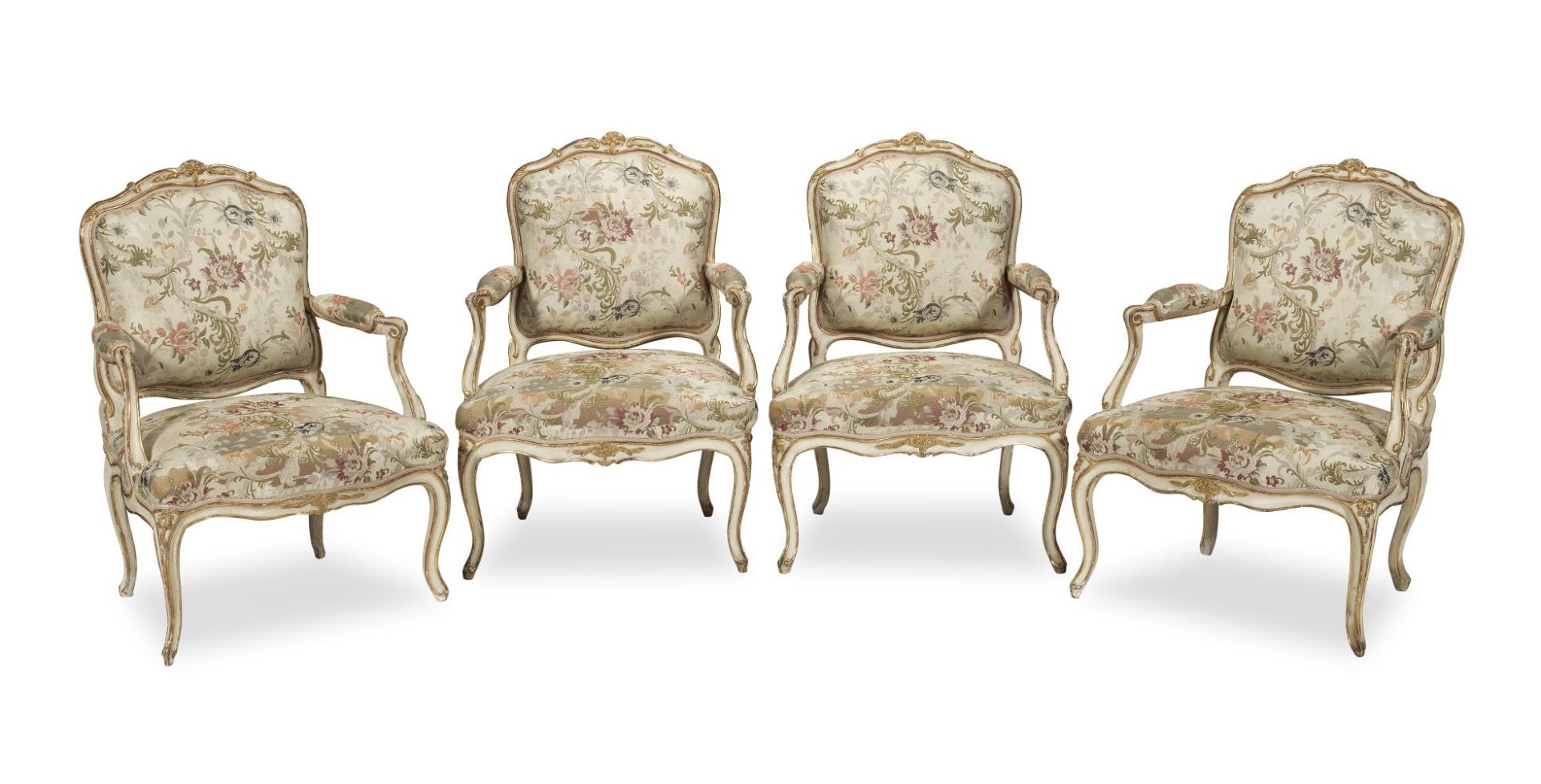 A set of four Louis XV painted and parcel gilt fauteuils a la Reine by Jean-Etienne Saint-Georges...