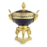 A French gilt bronze mounted porcelain potpourri pedestal bowl and cover in the Louis XVI style, ...