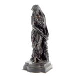 A late 19th century French patinated bronze figure of a Classical maiden in the manner of Jean Ja...
