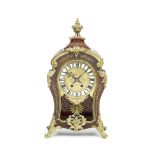 A 19th century French gilt brass mounted 'Boulle' tortoiseshell inlaid mantle clock the movement...