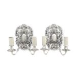 A pair of early 20th century silvered two light wall-sconces in the Baroque style (2)