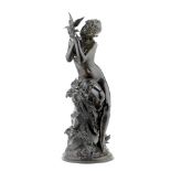 Mathurin Moreau (French, 1822 -1912): A patinated bronze figure of a young girl holding a bird