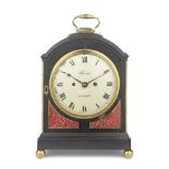 An early 19th century ebonised and gilt-metal mounted single pad top bracket clock the dial sign...