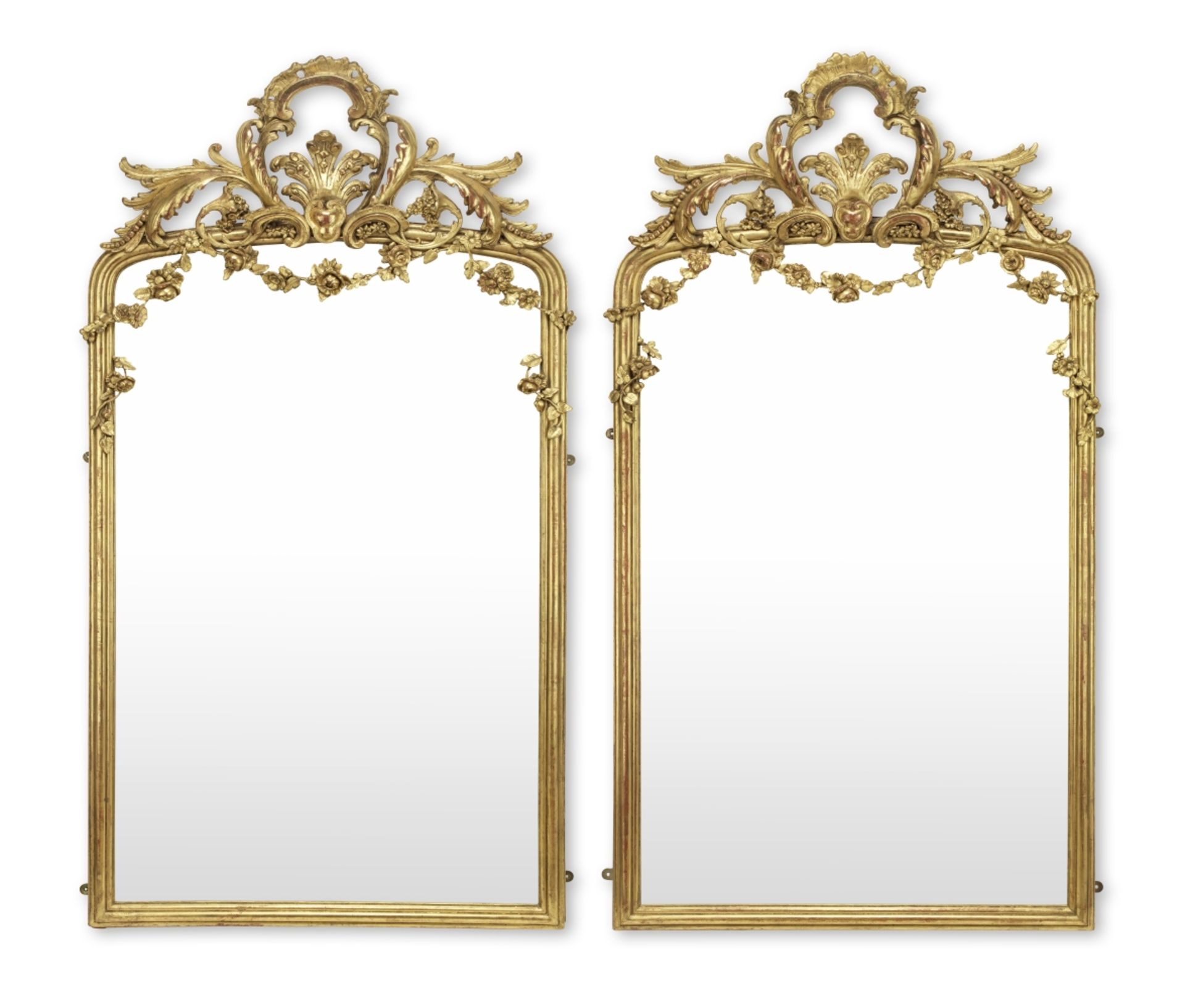 A pair of late 19th century Rococo revival giltwood and gilt composition pier mirrors (2)