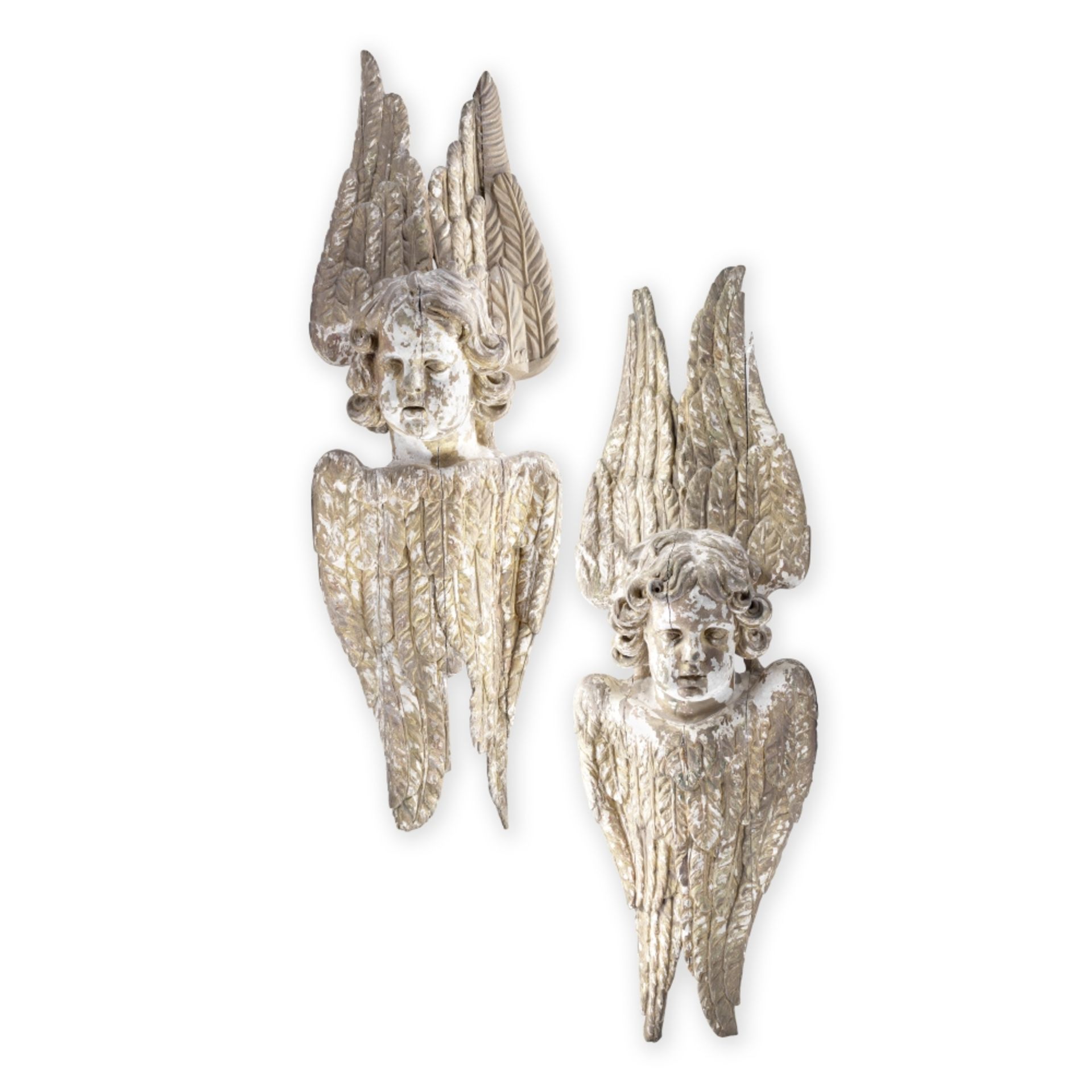 A pair of 18th century Italian carved giltwood winged putti maskhead appliques (2)