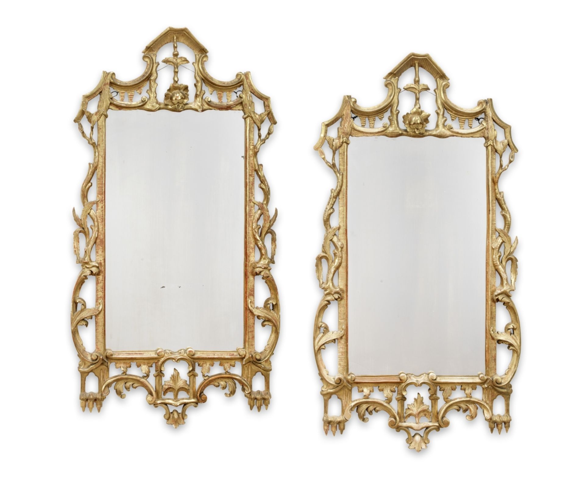 A pair of late 19th/early 20th century carved giltwood mirrors in the George III style (2)