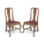 OF COLLECTORS' INTEREST: A pair of George I walnut, featherbanded and fruitwood marquetry side ch...