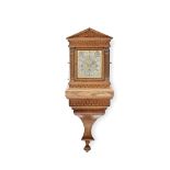 A good late 19th century German oak quarter chiming bracket clock with pull repeat and matching b...