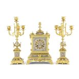 A late 19th century French gilt bronze and platinum ground porcelain inset clock garniture the m...