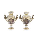 A pair of 19th century Paris style Fench porcelain garniture urns and covers (4)
