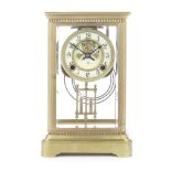 An early 20th century French brass four glass clock