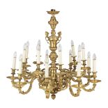 A late 19th/early 20th century French gilt bronze eighteen light chandelier in the R&#233;gence s...