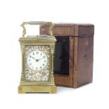 A late 19th century French carriage clock with repeat, with original travelling case (2)