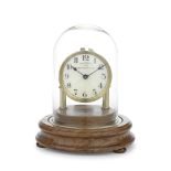 An early 20th century brass and enamel Eureka 'Clock' the dial signed Eureka Clock Co. Ltd, Londo...