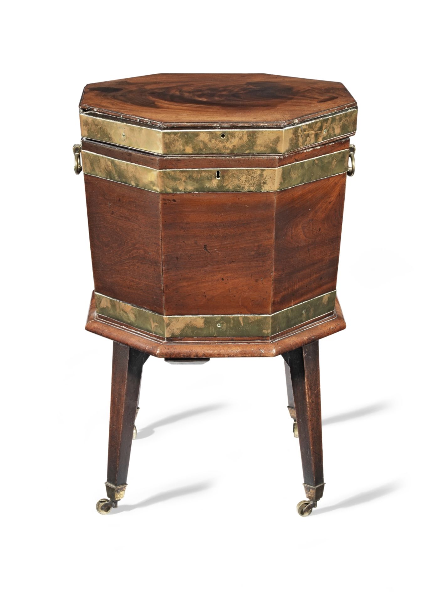 A late George III mahogany and brass mounted octagonal cellaret