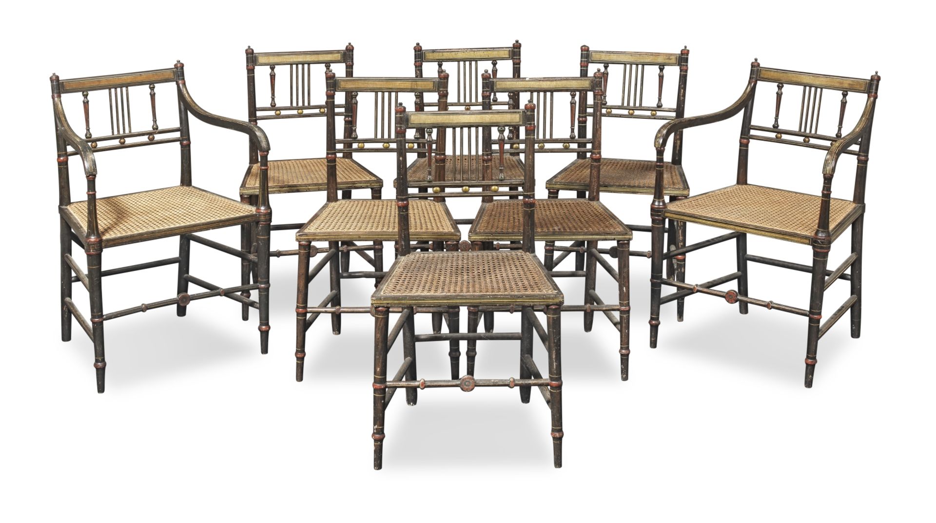 A set of eight 19th century simulated calamander, grisaille decorated and parcel gilt chairs (8)