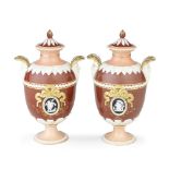 A pair of late 19th century Wedgwood neo-classical revival porcelain garniture vases and covers (2)