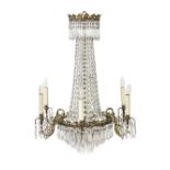 A Victorian six light gilt brass and cut glass tent and waterfall chandelier