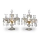 A pair of George III gilt bronze and cut glass twin branch lustre candelabra possibly Scottish (2)