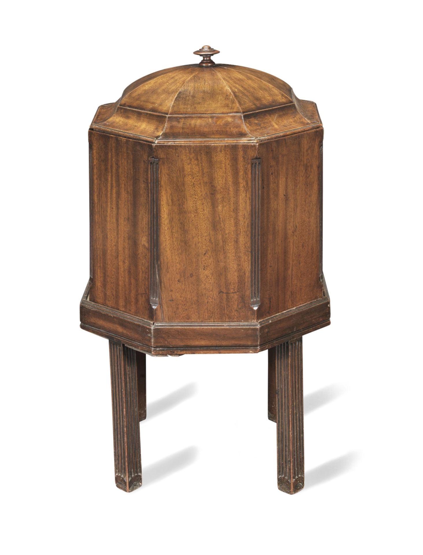 A 19th century mahogany octagonal cellaret in the George III style