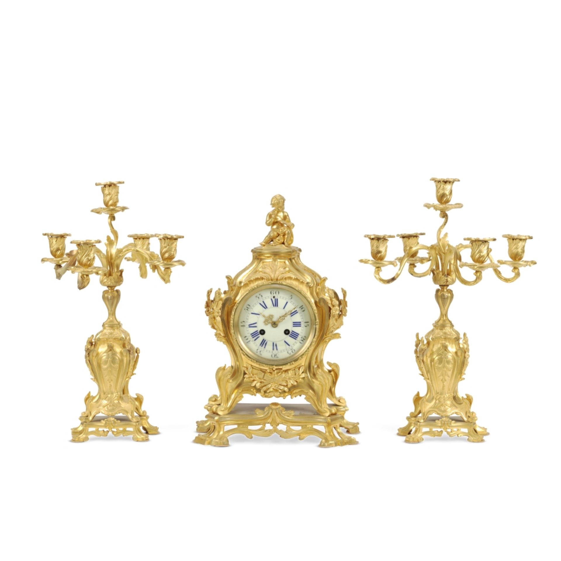 A late 19th century French gilt bronze clock garniture (3)