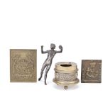 A bronze inkwell, two patinated bronze plaquettes and a silvered bronze figure the inkwell and t...