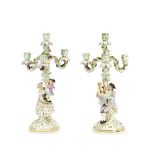 A pair of late 19th century Meissen porcelain figural four light candelabra (4)