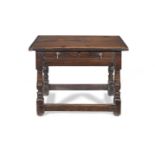 A 17th century-style oak side table