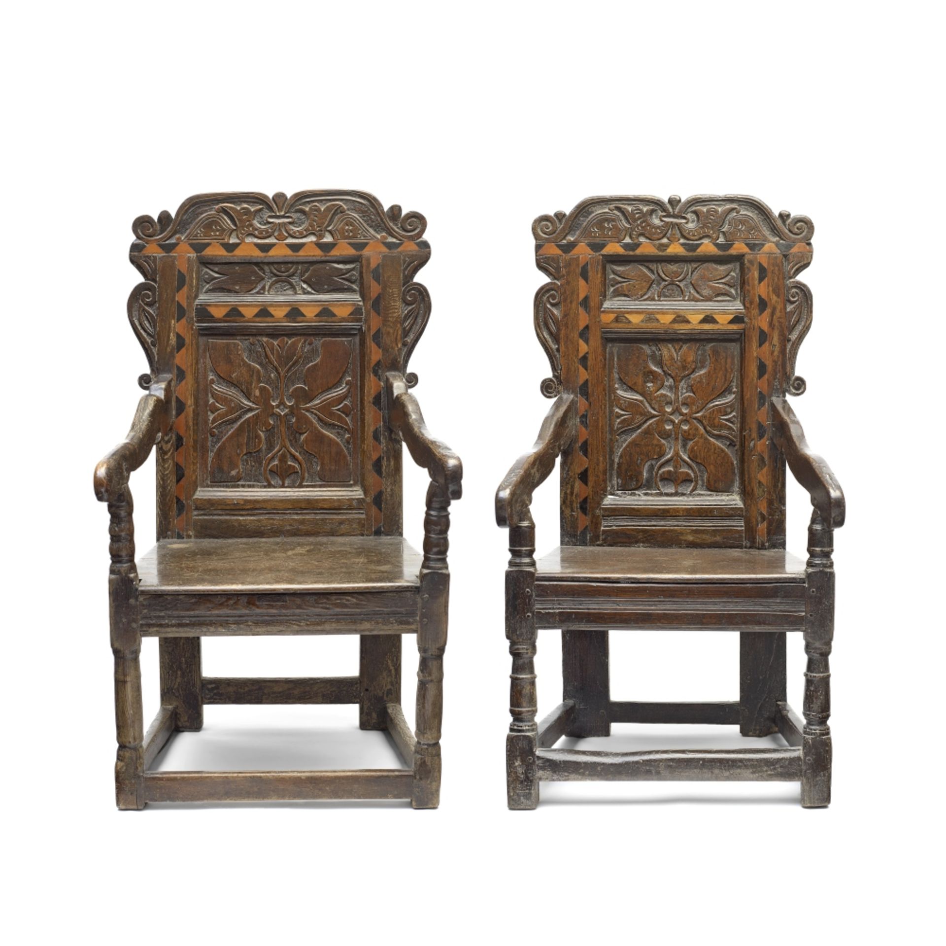 A near pair of 17th century oak panel back armchairsWest Yorkshire (2)