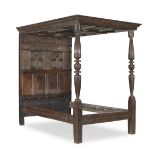 A South West oak jointed and panelled tester bed Early 17th century and later