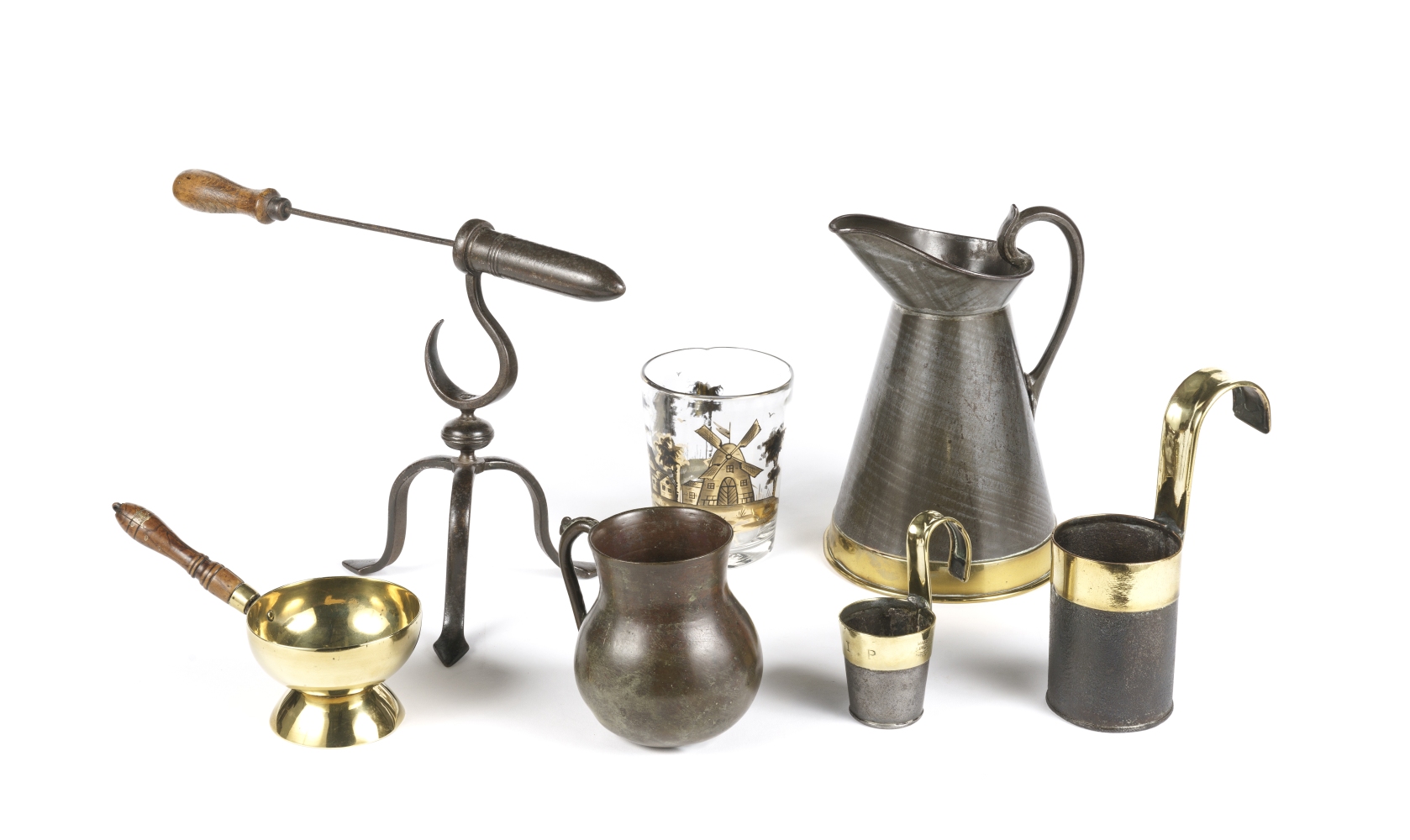 A collection of metalware including a Flemish bronze jug Possibly 16th century (7)