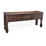 An early 18th century oak sideboard