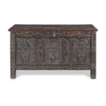 A Charles II carved oak coffer 1660-1690