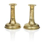 A pair of brass trumpet candlesticks Late 17th century