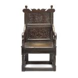 A 17th century oak wainscot chair