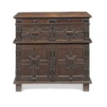 A Charles II oak and ebonised moulded chest Apparently largely restored during the 19th century