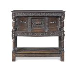 An oak court or 'livery' cupboard 17th century with various later embellishments and/or replacements