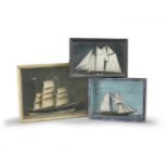 A group of three painted wood dioramas of ships Early 20th century (3)