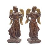 A pair of 18th century carved walnut figures of angels (2)