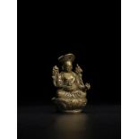 STATUETTE D'UN LAMA DRUGPA KAGYU EN LAITON INCRUST&#201; D'ARGENT ET DE CUIVRE BHOUTAN OU TIBET, ...