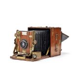 A HOUGHTONS LTD SANDERSON QUARTER-PLATE TROPICAL REFLEX CAMERA ENGLISH, EARLY 20TH CENTURY,