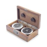 AN ENIGMA ROTOR BOX WITH TWO ROTORS, GERMAN, DATED 1936,