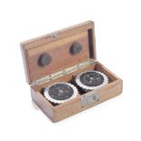 AN ENIGMA ROTOR BOX WITH TWO ROTORS, GERMAN, DATED 1936,