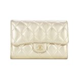 Chanel: a Metallic Gold Lambskin Wallet 2014-15 (includes serial sticker and dust bag)