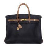 Herm&#232;s: a Black and Gold Bi-Colour Birkin 40 1990 (includes padlock, keys, cloche, shoulder ...