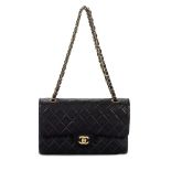 Chanel: a Black Lambskin Medium Classic Double Flap Bag 1997-99 (includes serial sticker, authent...