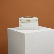 Herm&#232;s: a Gris Perle Ostrich Kelly Pochette 2022 (includes felt protector, dust bag, and box)