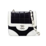 Chanel: a Black and White Patent Leather Square Mini Flap Bag 2000-02 (includes serial sticker, a...